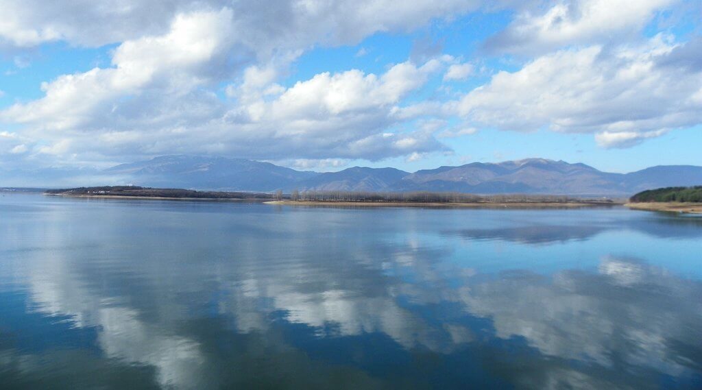 Sky perfectly reflected in the water at the Koprinka dam in Kazanlak.