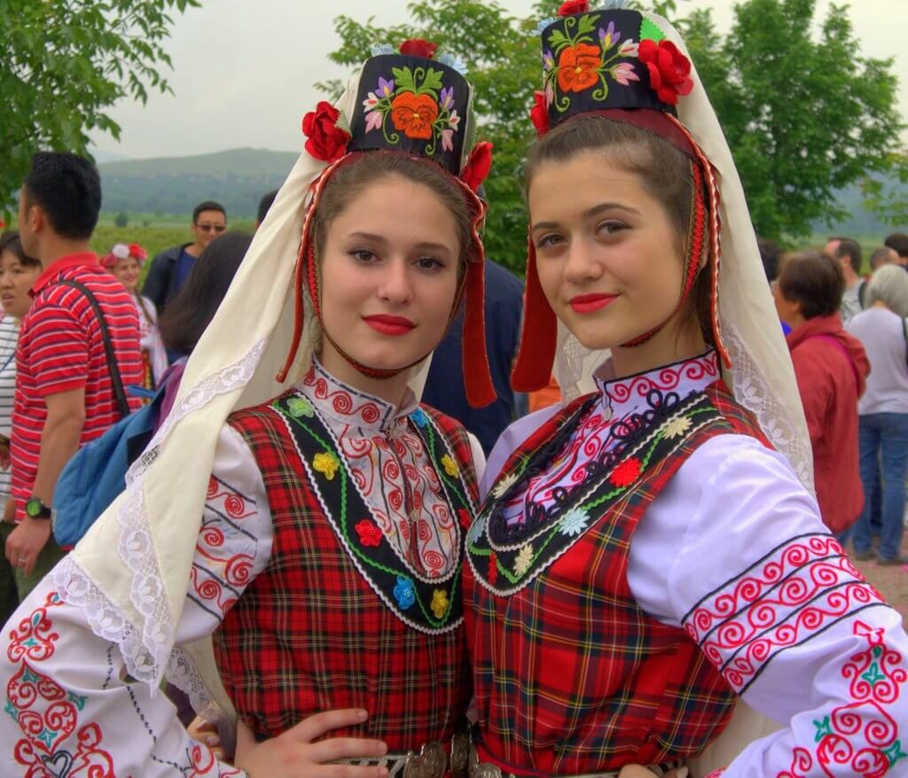 Rose Festival Kazanlak: Girls with Traditional Bulgarian Folklore clothing during the rose-picking ritual near Kazanlak, Bulgaria
